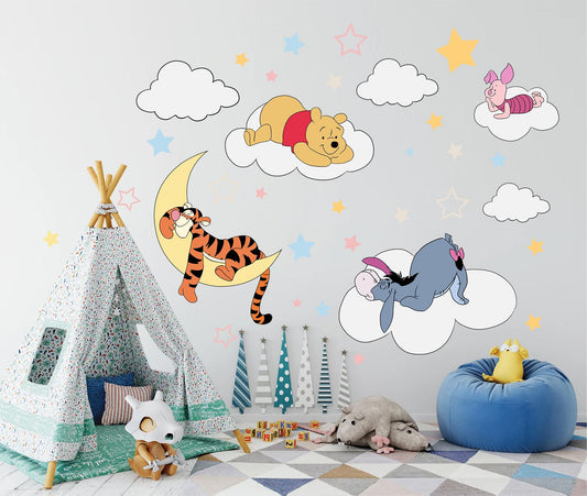Night Winnie wall decals on light grey nursery wall with teepee, star and cloud decorations