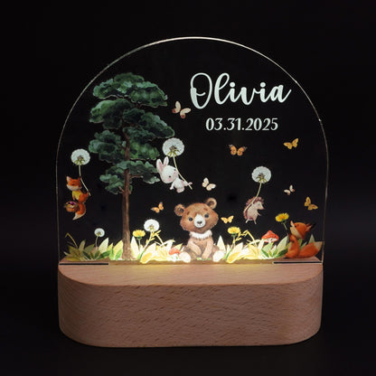 Personalised forest animal LED night light with custom baby name on beechwood base