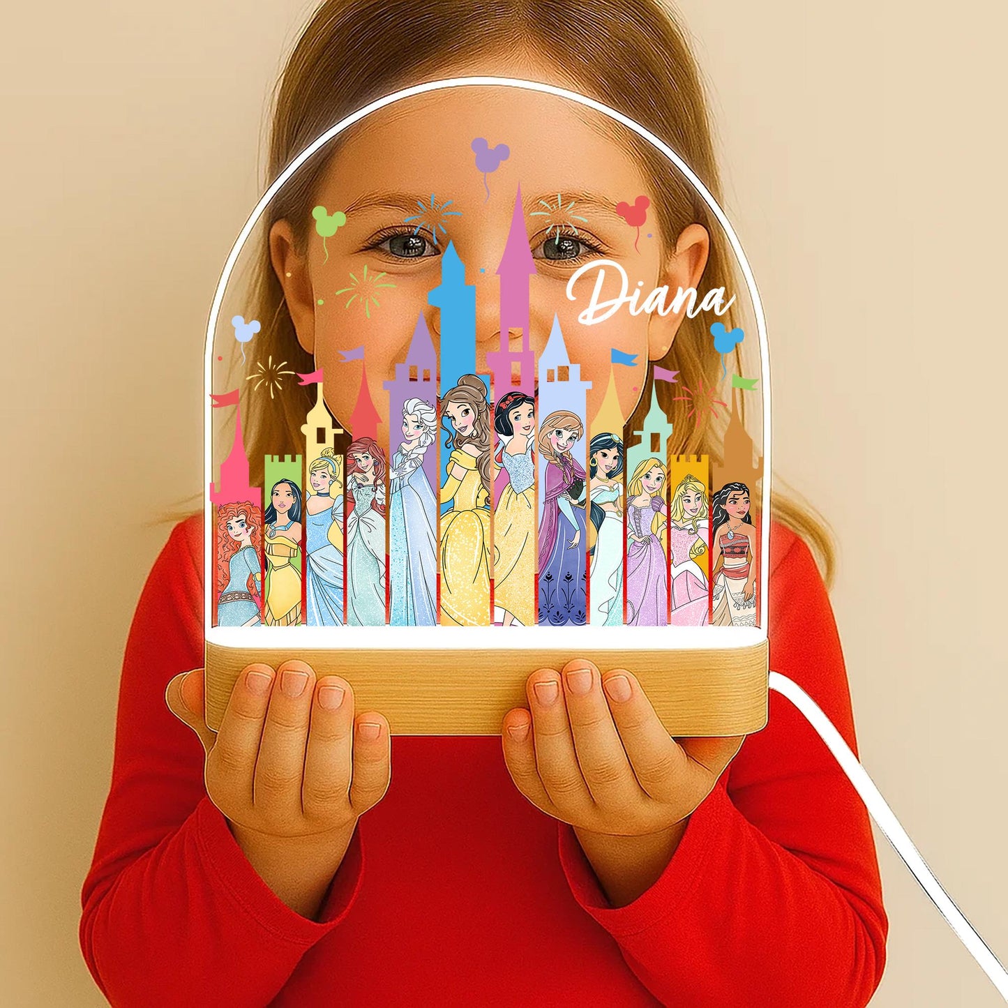 Princess castle night light glowing warm white in girls nursery
