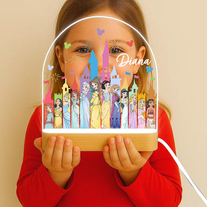 Princess castle night light glowing warm white in girls nursery